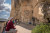 An interpreter giving a tour of the pictographs and petroglyph found at Writing-on-Stone