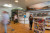 People inside of the visitor information centre for Tourism Lethbridge.  The information centre has many people in it with lots of different publications and brochures.